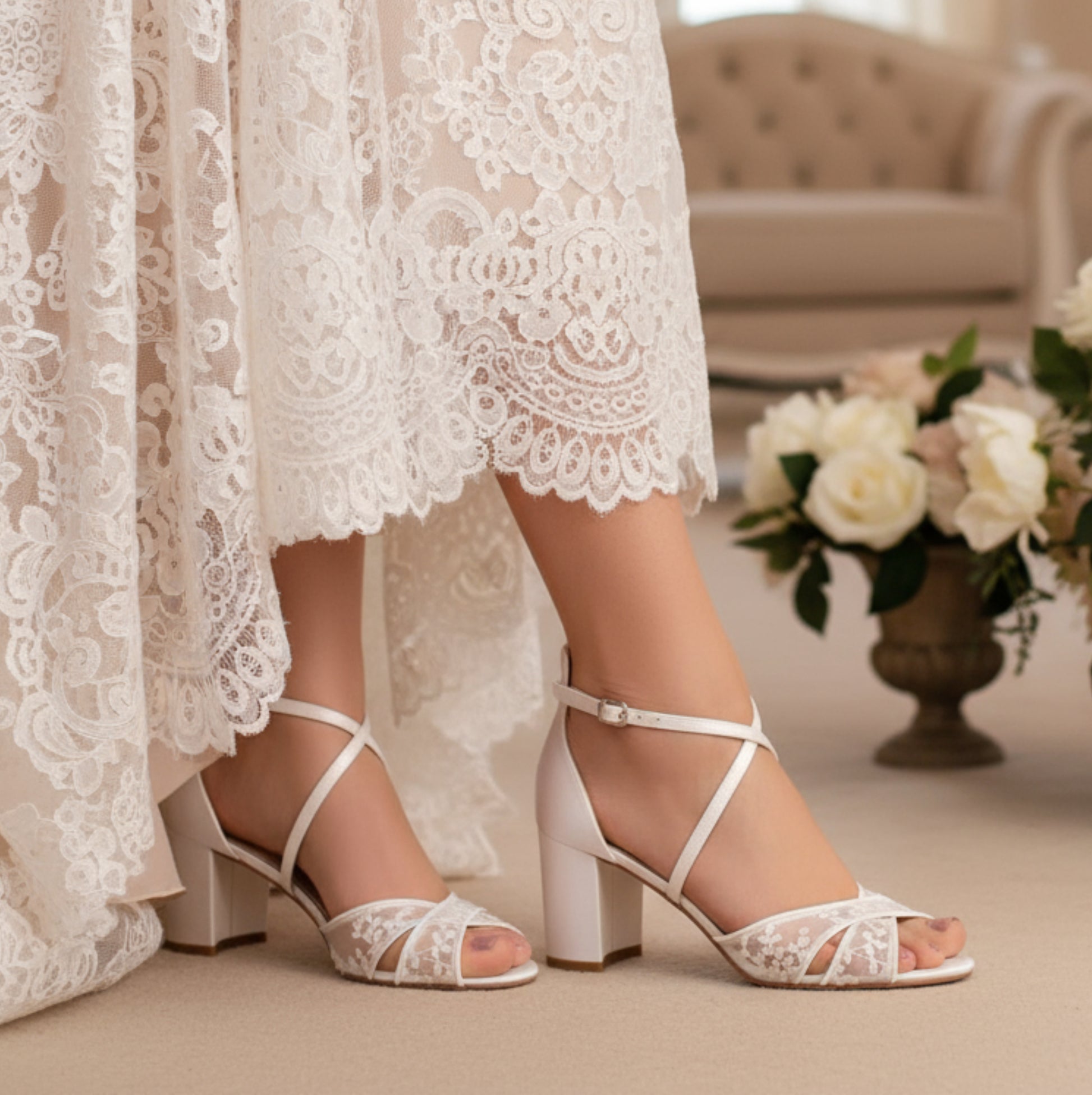 Strappy Ivory lace bridal sandals with two wide cross straps, and 7 cm (2.75 in) block heel